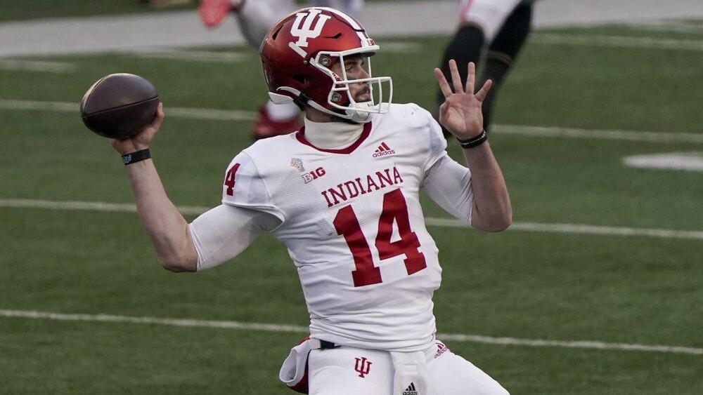 Indiana's Jack Tuttle throws a pass
